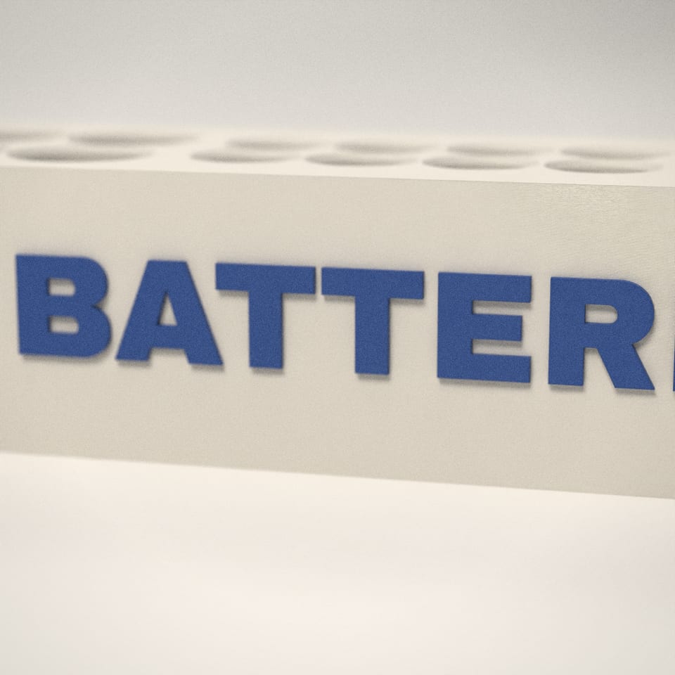 Close-up of the 'BATTERIES' lettering, showing the fine 0.2 mm print layers