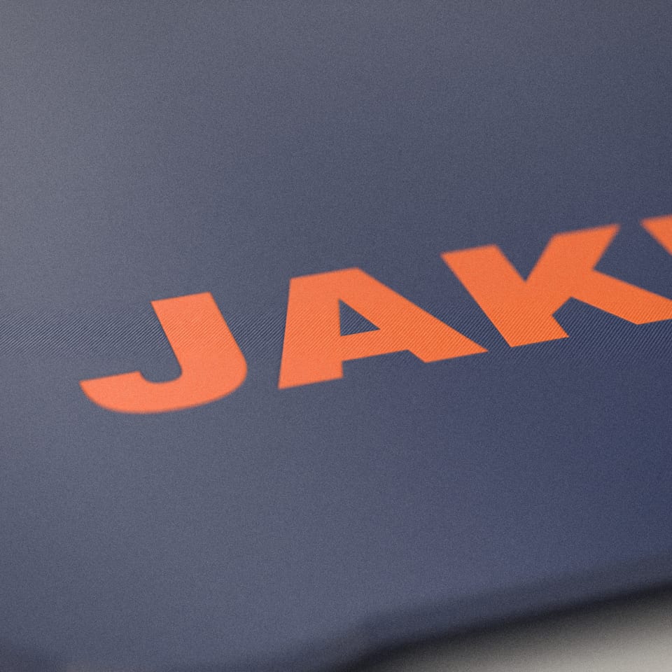 Close-up of the 'JAKE' lettering, showing the fine 0.2 mm print layers