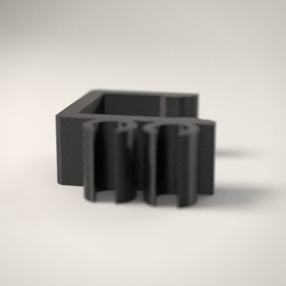 Desk-Edge Cable Clips from a low side angle, showing how far the lettering stands up