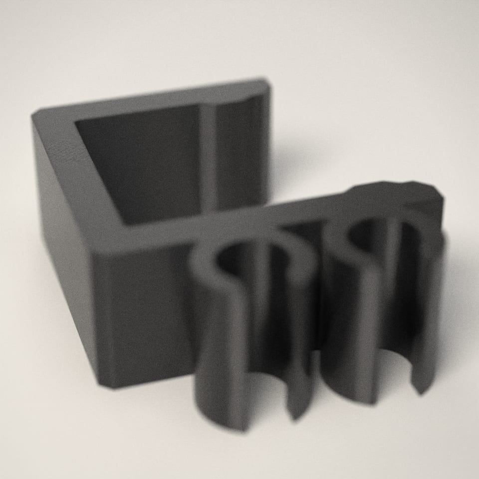 Close-up of the lettering, showing the fine 0.2 mm print layers