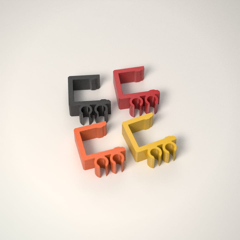 Desk-Edge Cable Clips in 4 colours: Jet Black, Post-box Red, Hi-Vis Orange, Sunflower