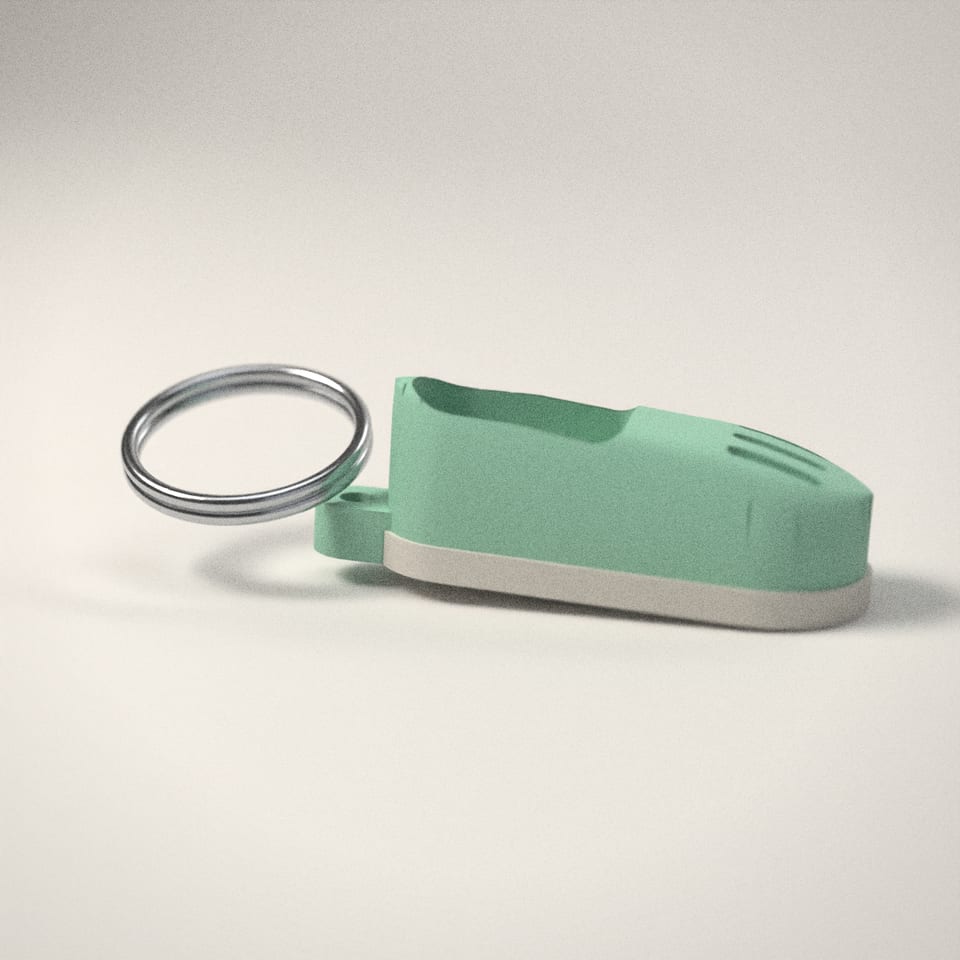 Mini Clog Keychain from a low side angle, showing how far the lettering stands up