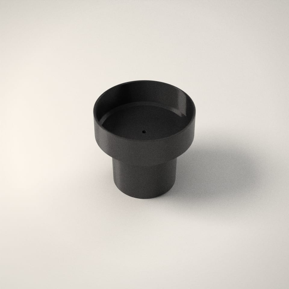 Car Cup Holder Adapter (Made to Fit) from a low side angle, showing how far the lettering stands up