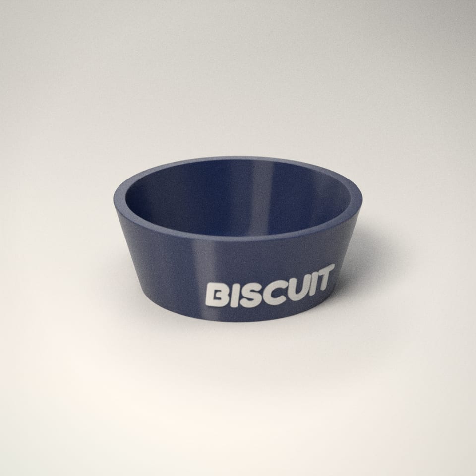 Navy personalised Dog Bowl reading 'BISCUIT' in Snow White letters