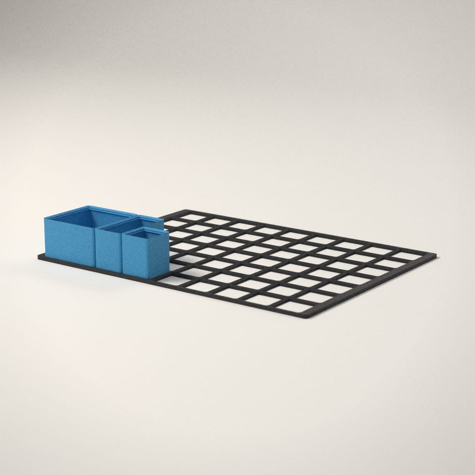 Made-to-Measure Gridfinity Drawer Kit from a low side angle, showing how far the lettering stands up