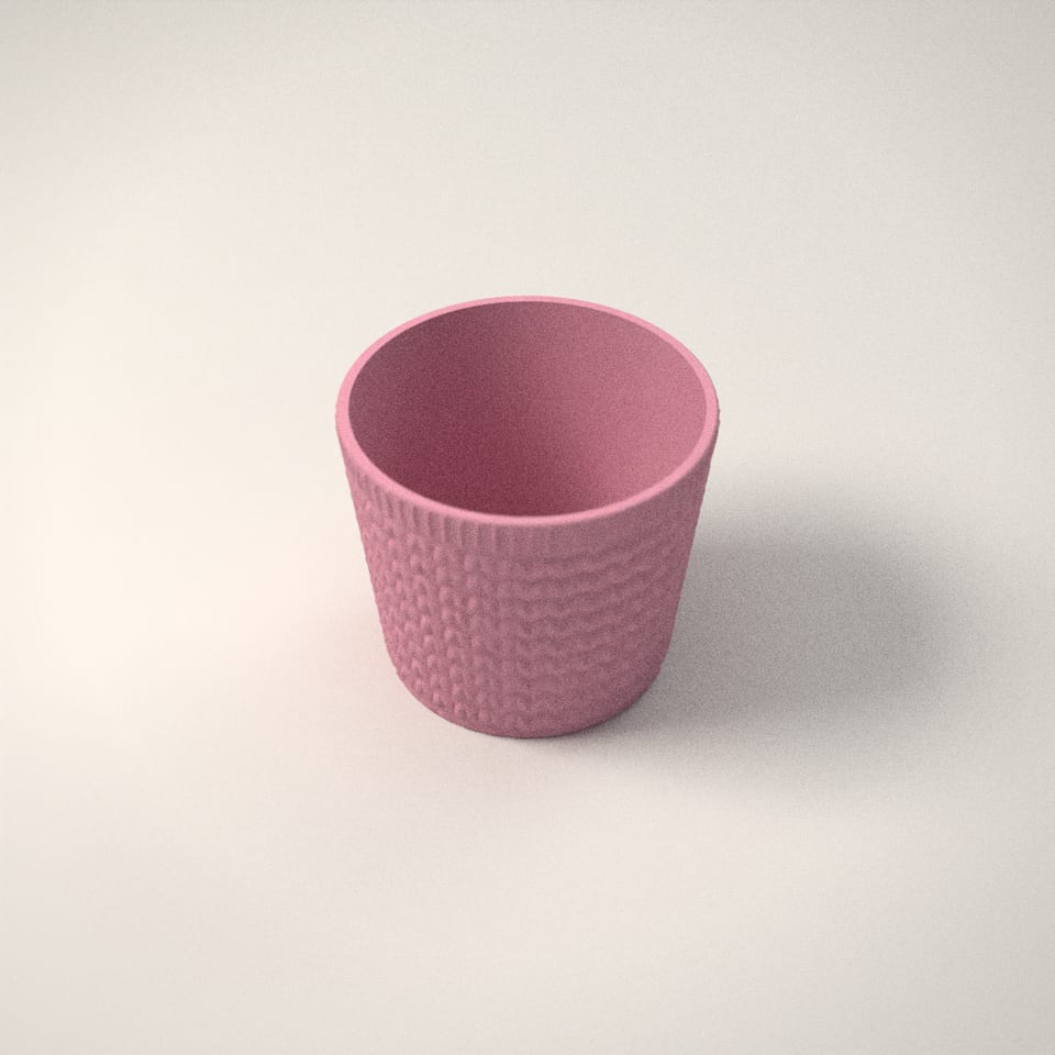 Knitted-Look Plant Pot from a low side angle, showing how far the lettering stands up