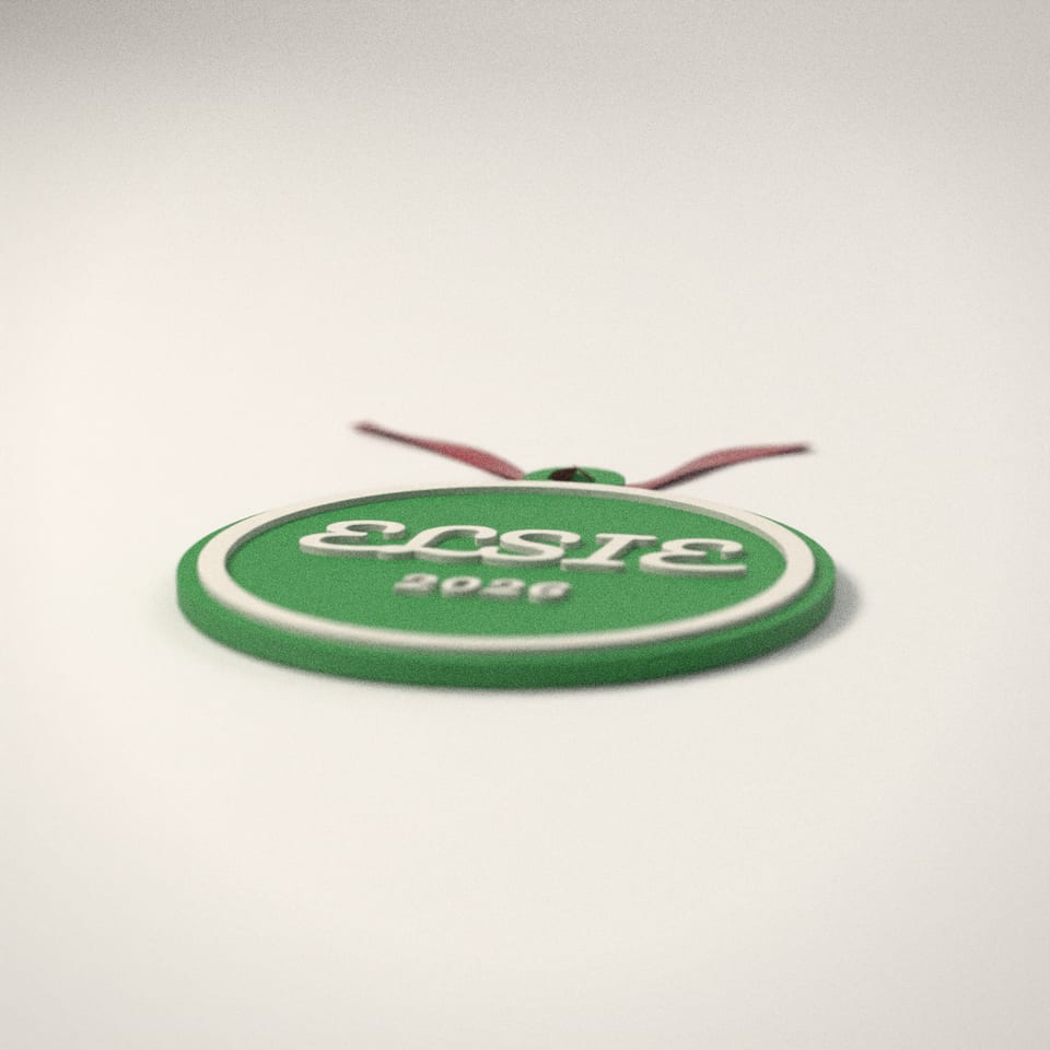 Personalised Name Christmas Bauble from a low side angle, showing how far the lettering stands up