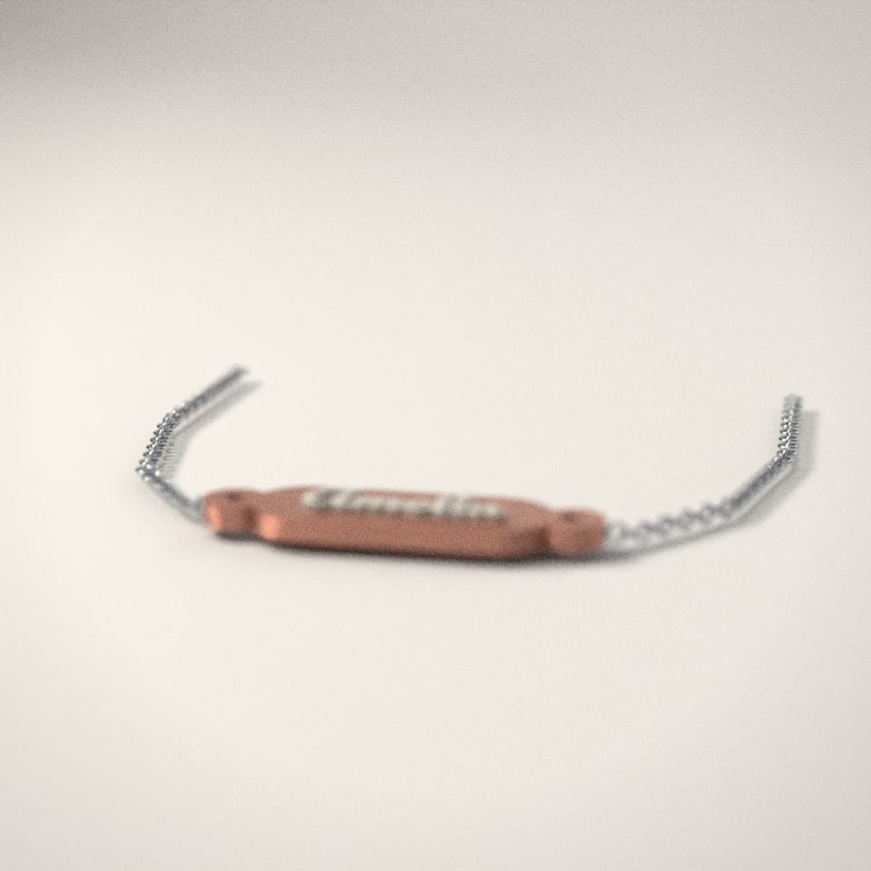 Personalised Name Necklace from a low side angle, showing how far the lettering stands up