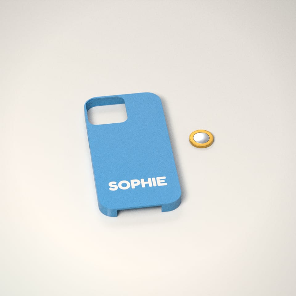 Personalised Name Phone Case next to a £1-coin-sized disc for scale