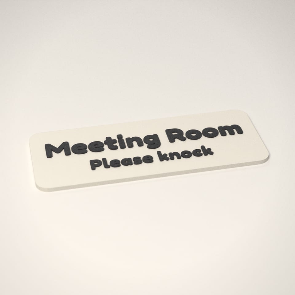 Ivory White personalised Door Sign reading 'Meeting Room' in Charcoal letters