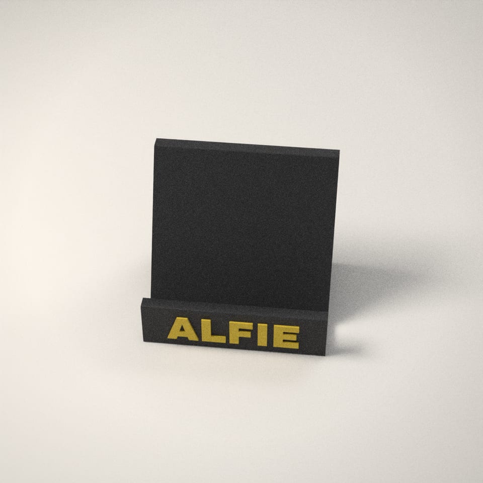 Personalised Phone Stand from a low side angle, showing how far the lettering stands up