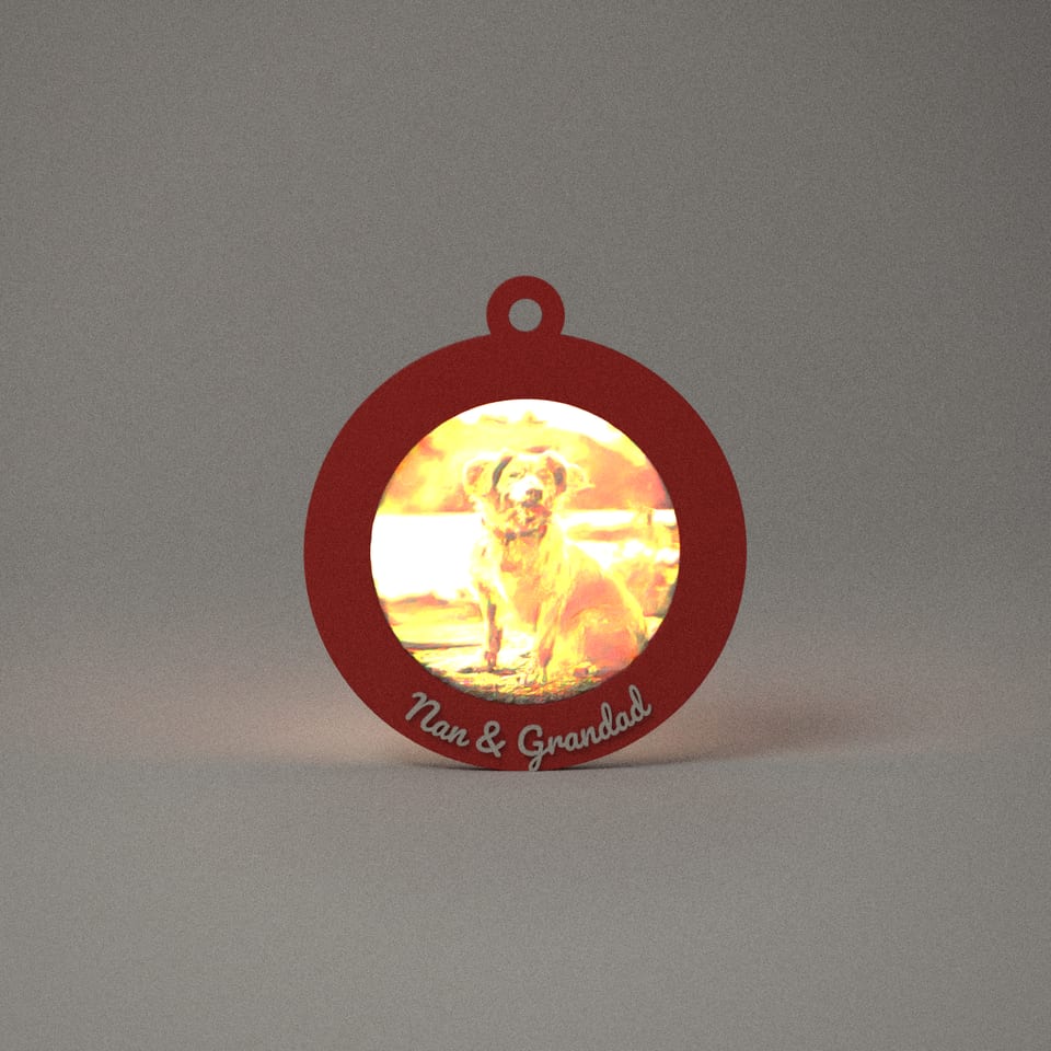 Scarlet Red Photo Lithophane Bauble reading 'Nan & Grandad', lit from behind so the photo glows