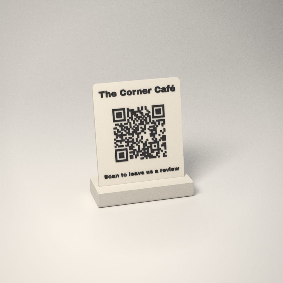 Ivory White Scan to Review QR Stand reading 'The Corner Café' in Charcoal letters