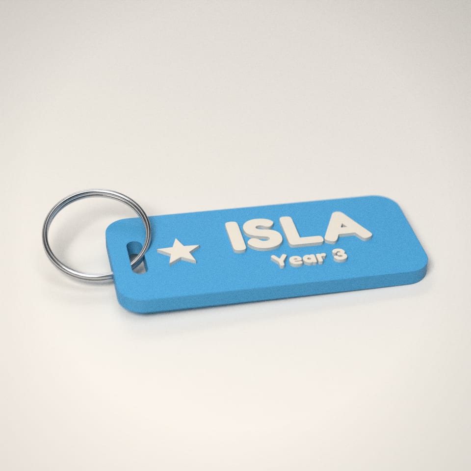 Sky Blue School Bag Name Tag reading 'ISLA' in Ivory White letters