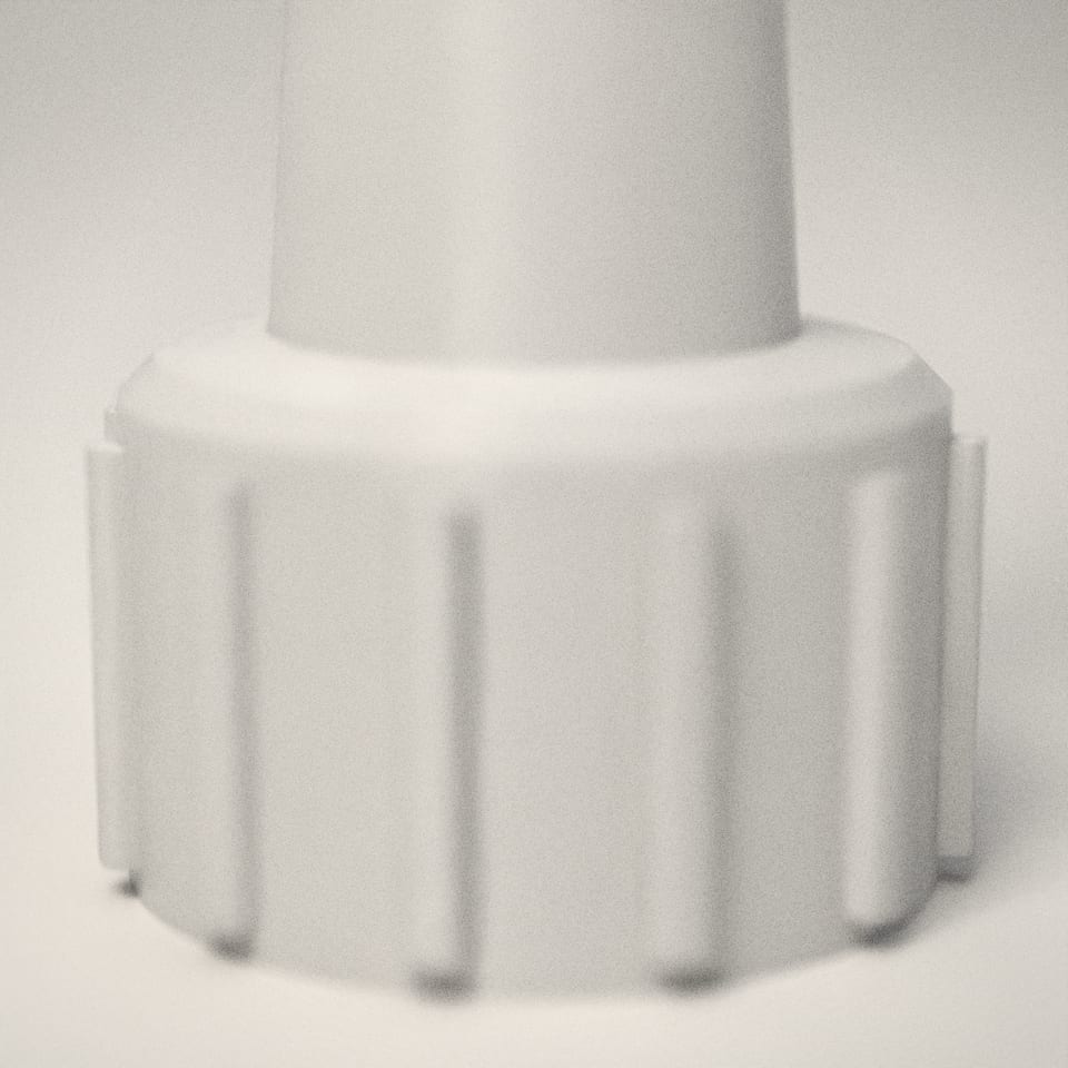 Close-up of the lettering, showing the fine 0.2 mm print layers
