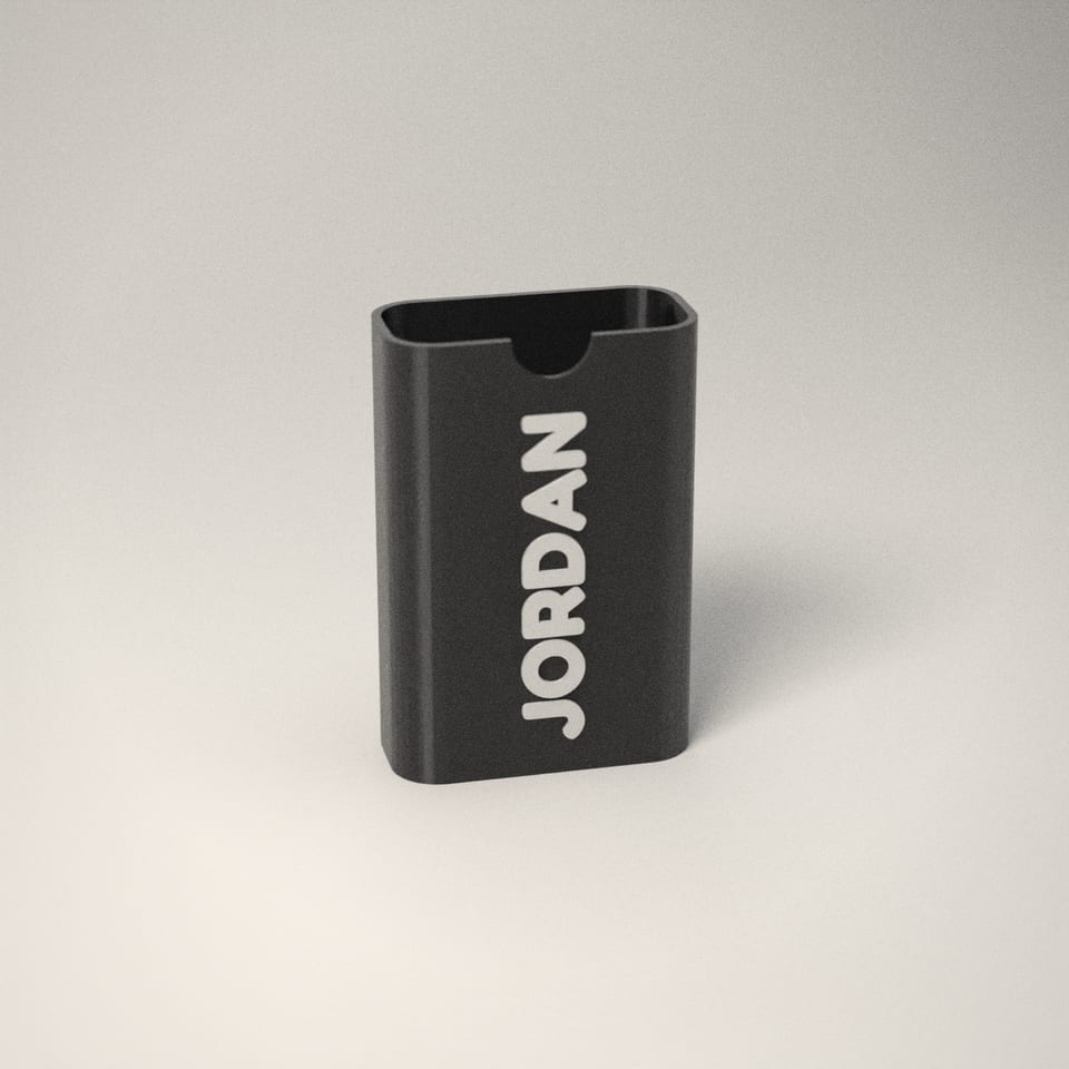Jet Black personalised Vape Case reading 'JORDAN' in Snow White letters
